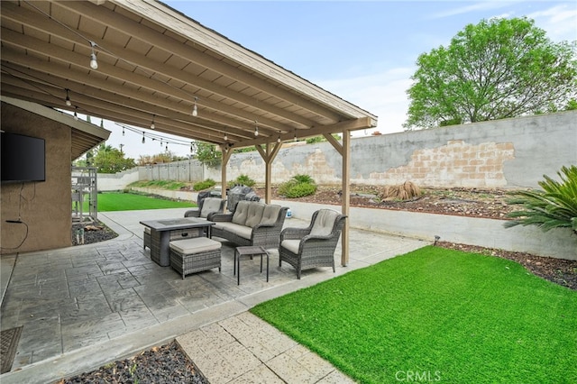 view of patio / terrace featuring outdoor lounge area and a fenced backyard