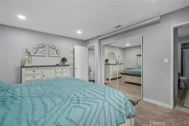 bedroom with visible vents, carpet floors, baseboards, recessed lighting, and a closet