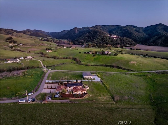 aerial view with a rural view and a mountain view