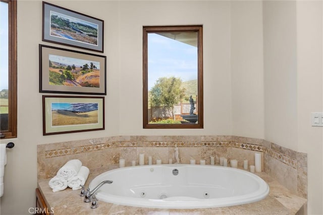 bathroom with a jetted tub