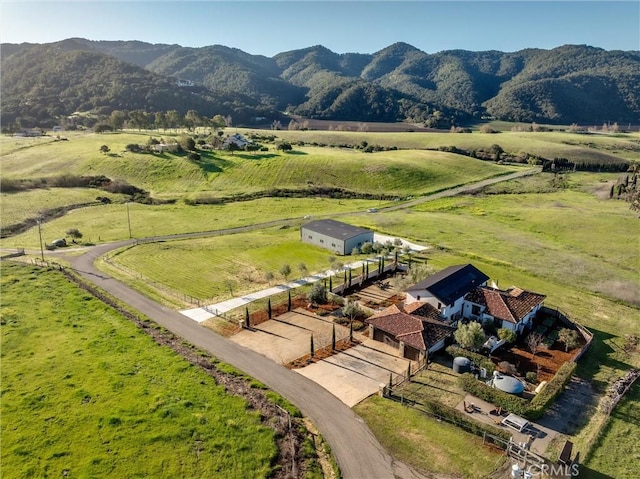 bird's eye view featuring a mountain view and a rural view