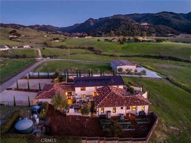 birds eye view of property featuring a rural view and a mountain view