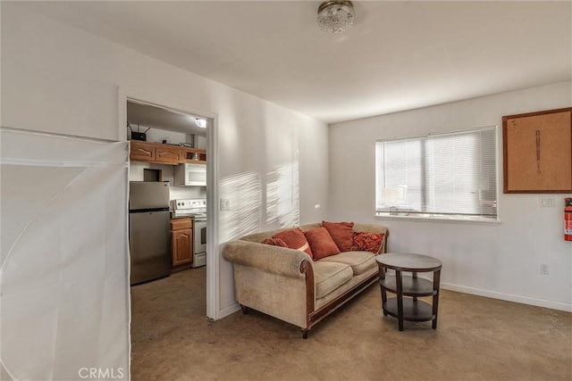 living room featuring baseboards