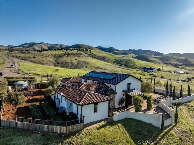 birds eye view of property featuring a rural view and a mountain view