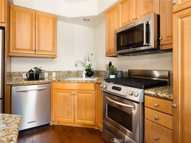 21345 Hawthorne Blvd Unit 415, Torrance, CA 90503 - kitchen with a sink, stainless steel appliances, light stone countertops, and dark wood finished floors