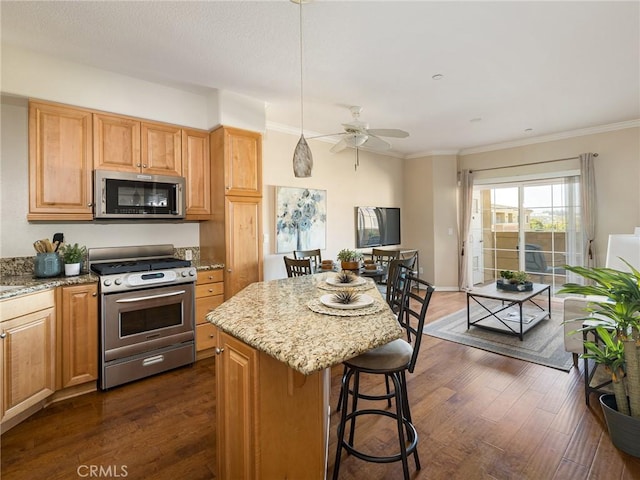 21345 Hawthorne Blvd Unit 415, Torrance, CA 90503 - kitchen with a kitchen breakfast bar, stainless steel appliances, dark wood-type flooring, and light stone countertops
