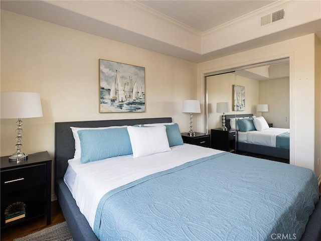 21345 Hawthorne Blvd Unit 415, Torrance, CA 90503 - bedroom with visible vents, wood finished floors, a closet, and ornamental molding