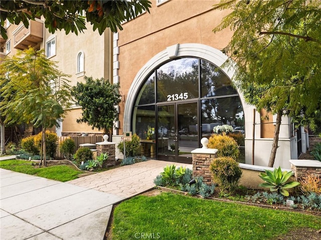 21345 Hawthorne Blvd Unit 415, Torrance, CA 90503 - property entrance with stucco siding