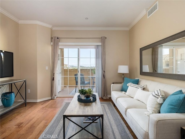 21345 Hawthorne Blvd Unit 415, Torrance, CA 90503 - living room with crown molding, wood finished floors, visible vents, and baseboards