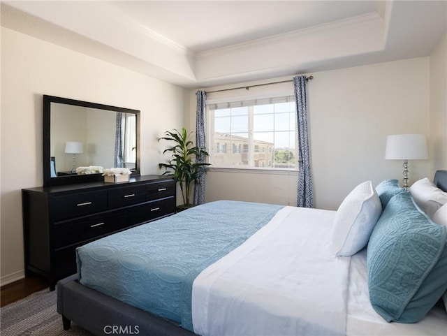 21345 Hawthorne Blvd Unit 415, Torrance, CA 90503 - bedroom featuring wood finished floors, baseboards, a raised ceiling, and ornamental molding