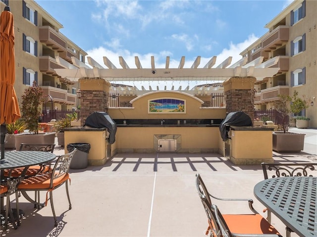 21345 Hawthorne Blvd Unit 415, Torrance, CA 90503 - view of patio featuring outdoor dining area, area for grilling, and exterior kitchen
