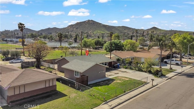 drone / aerial view featuring a mountain view