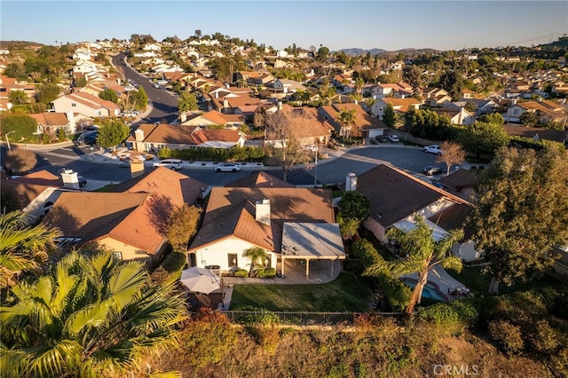 birds eye view of property with a residential view