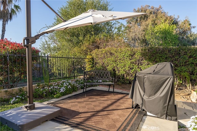 view of patio with fence