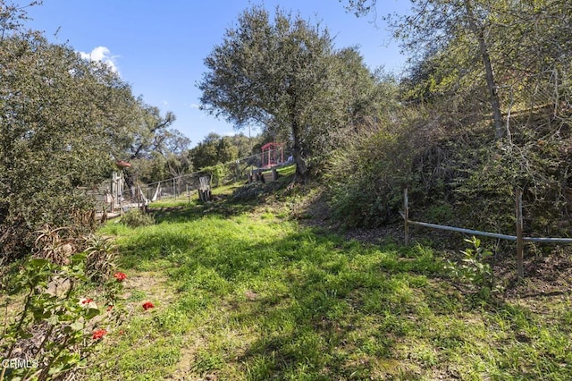 view of yard with fence