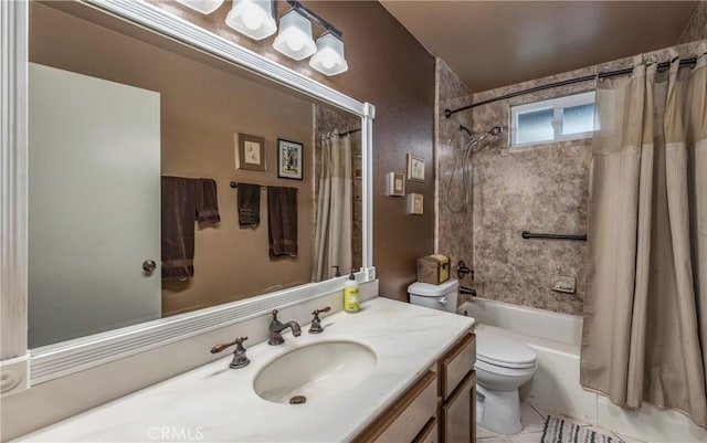 bathroom featuring toilet, vanity, and shower / bath combo