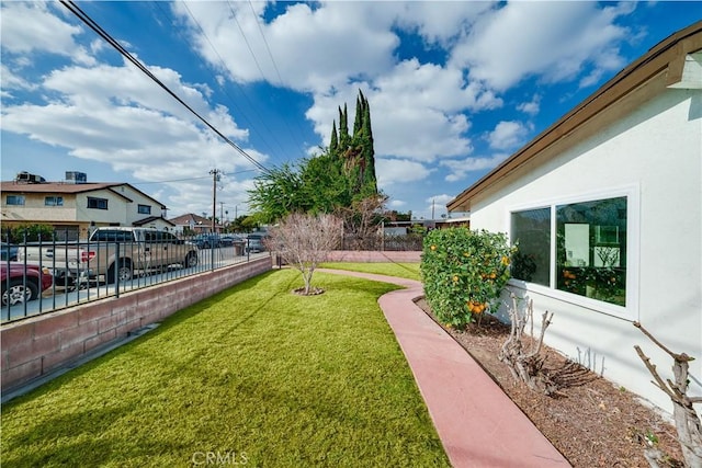 view of yard featuring fence