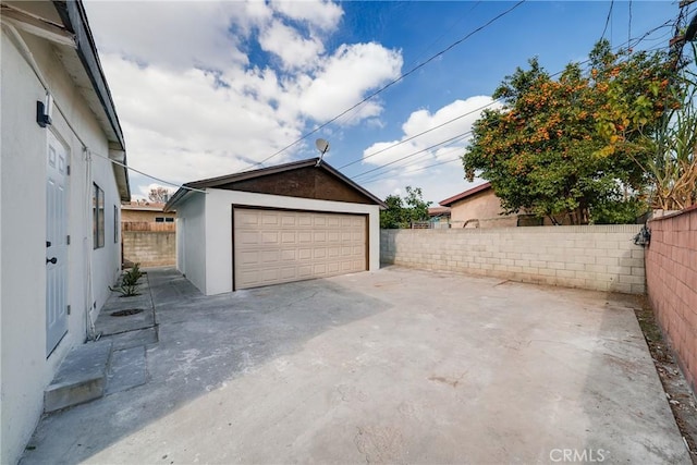 detached garage with fence