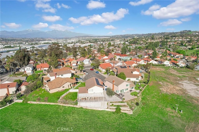 drone / aerial view with a residential view and a mountain view