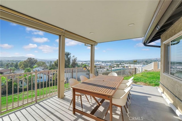 balcony with outdoor dining area