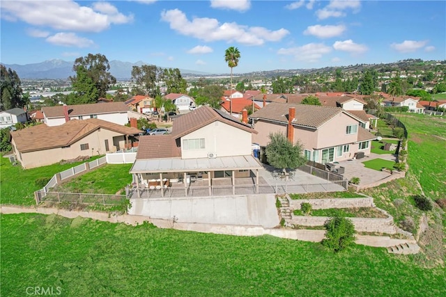 bird's eye view with a residential view and a mountain view