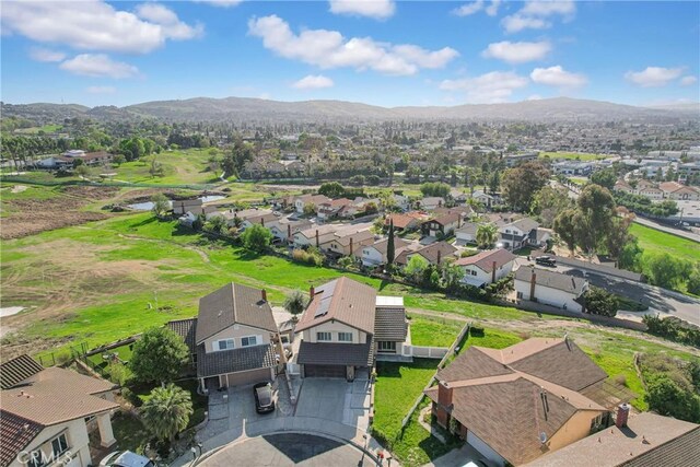 drone / aerial view with a mountain view and a residential view