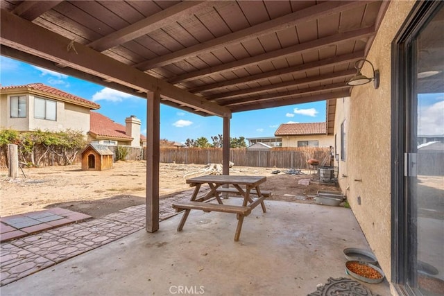 view of patio / terrace with outdoor dining area and a fenced backyard