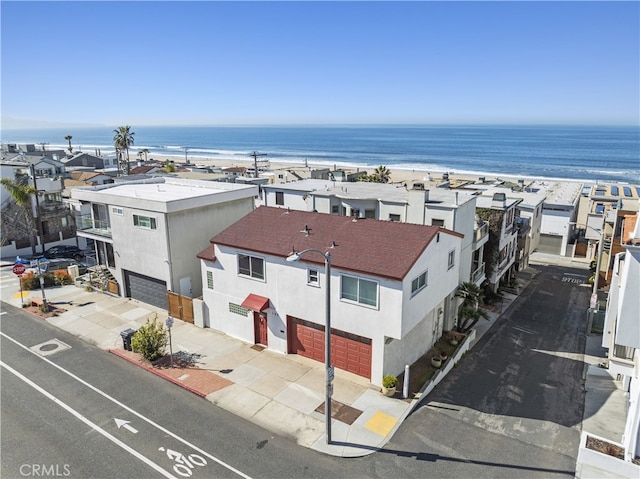 birds eye view of property featuring a residential view and a water view