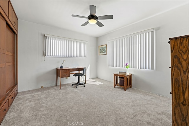 office space with carpet flooring and ceiling fan