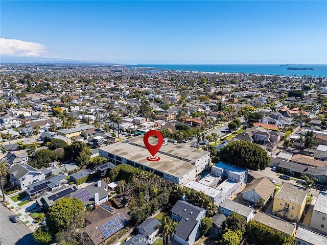 aerial view with a residential view and a water view