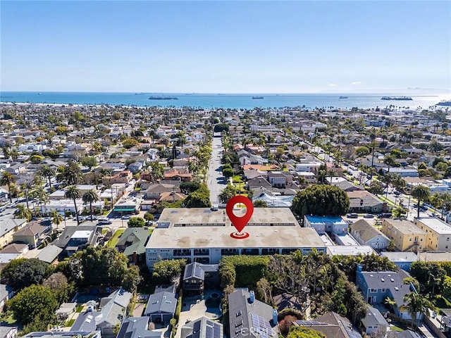 aerial view featuring a water view and a residential view