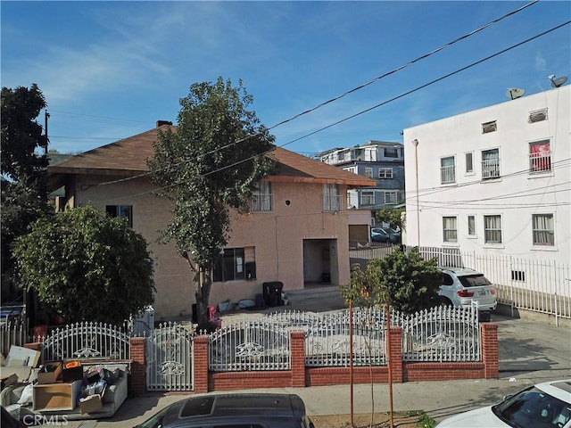 view of property with a fenced front yard