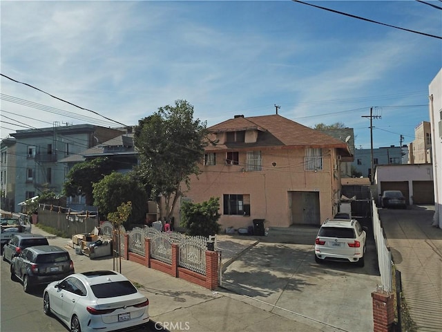 view of front of property with fence