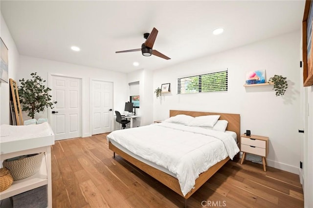 3345 Oakhurst Ave, Los Angeles, CA 90034 - bedroom featuring light wood finished floors, recessed lighting, an office area, a ceiling fan, and baseboards
