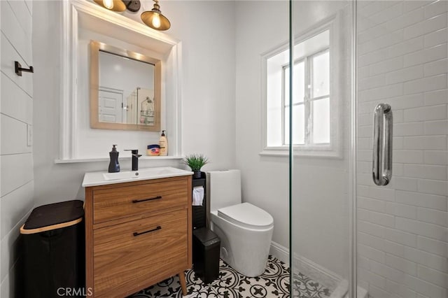 3345 Oakhurst Ave, Los Angeles, CA 90034 - full bath with a shower stall, toilet, vanity, and tile patterned flooring