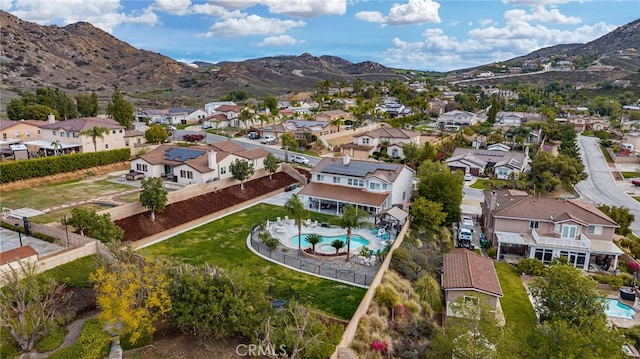 bird's eye view featuring a mountain view and a residential view