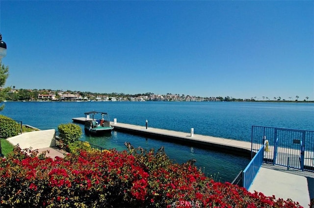 dock area featuring a water view