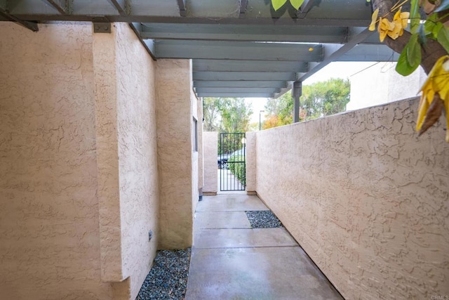 view of patio / terrace with a gate