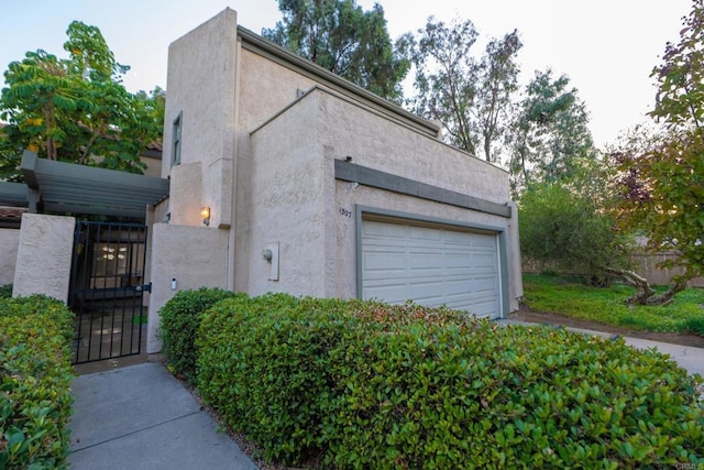 garage featuring a gate