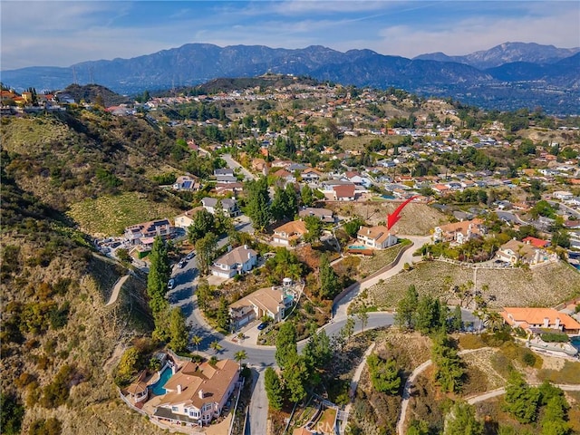 aerial view featuring a mountain view and a residential view