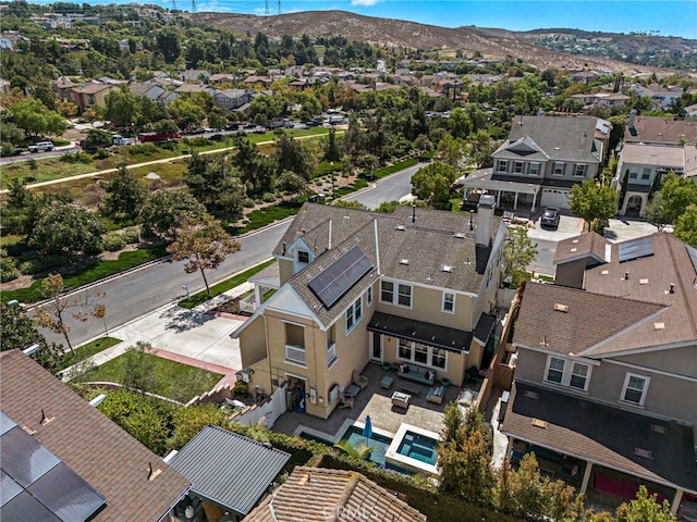 bird's eye view with a mountain view and a residential view