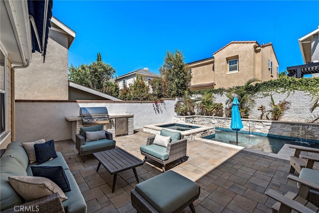 view of patio featuring grilling area, an outdoor living space, a pool with connected hot tub, and exterior kitchen