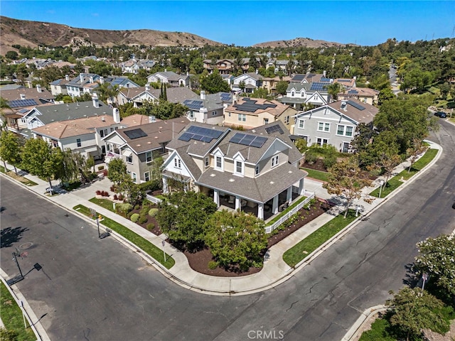 aerial view featuring a mountain view and a residential view