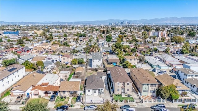 aerial view featuring a residential view and a mountain view