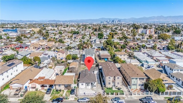 drone / aerial view with a mountain view and a residential view