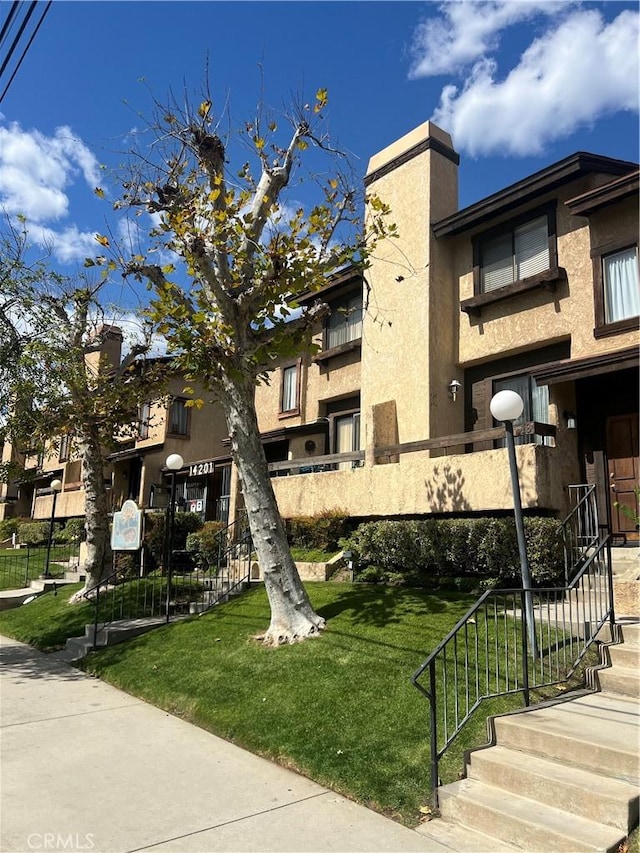view of property featuring fence