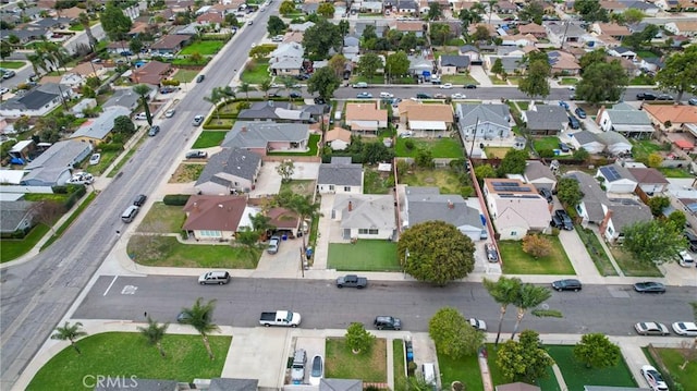 birds eye view of property with a residential view