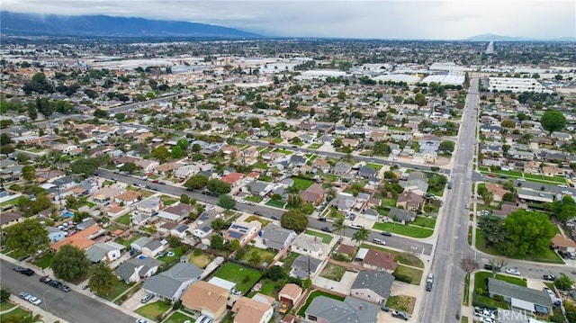 bird's eye view featuring a residential view and a mountain view