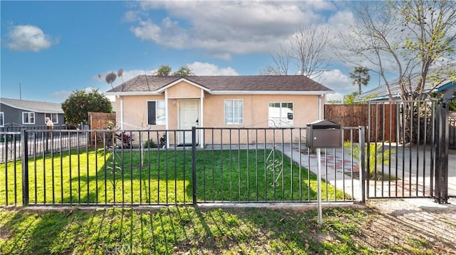 bungalow-style home with a fenced front yard, stucco siding, and a front yard