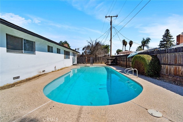 view of swimming pool featuring a fenced in pool and a fenced backyard